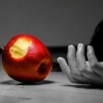 Snow White beside apple