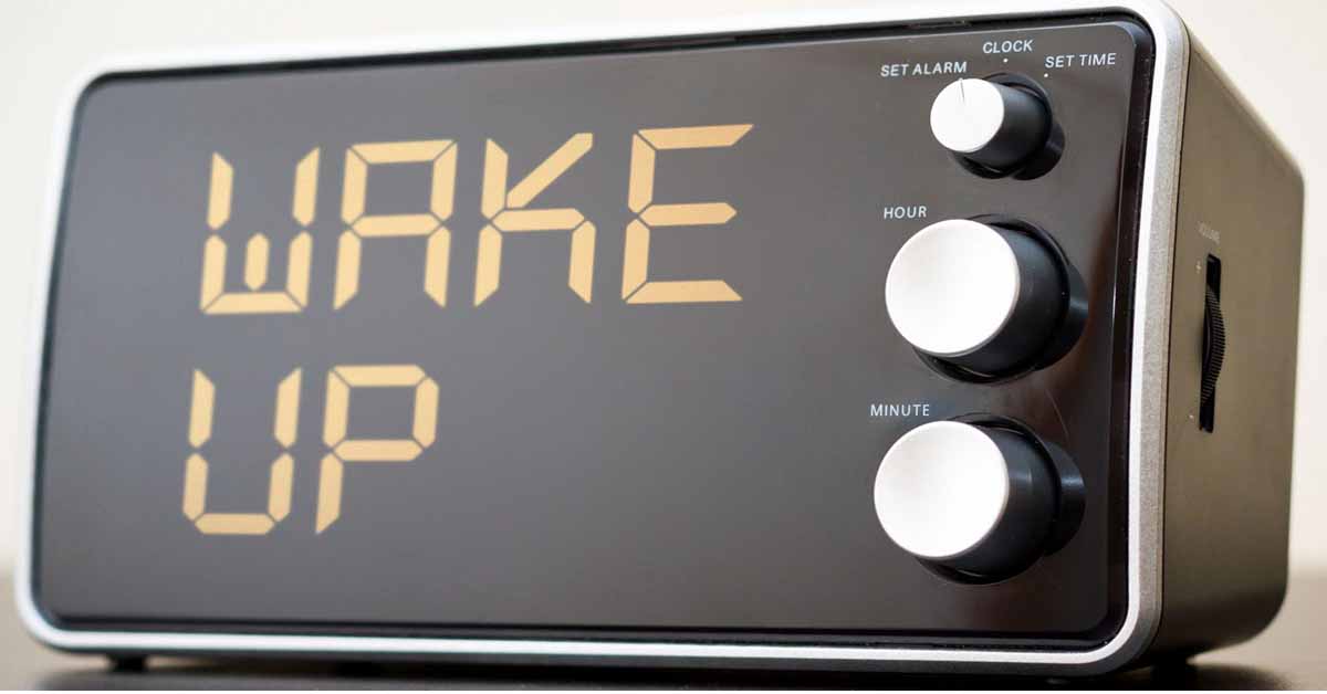 an alarm clock with wake up on the dial